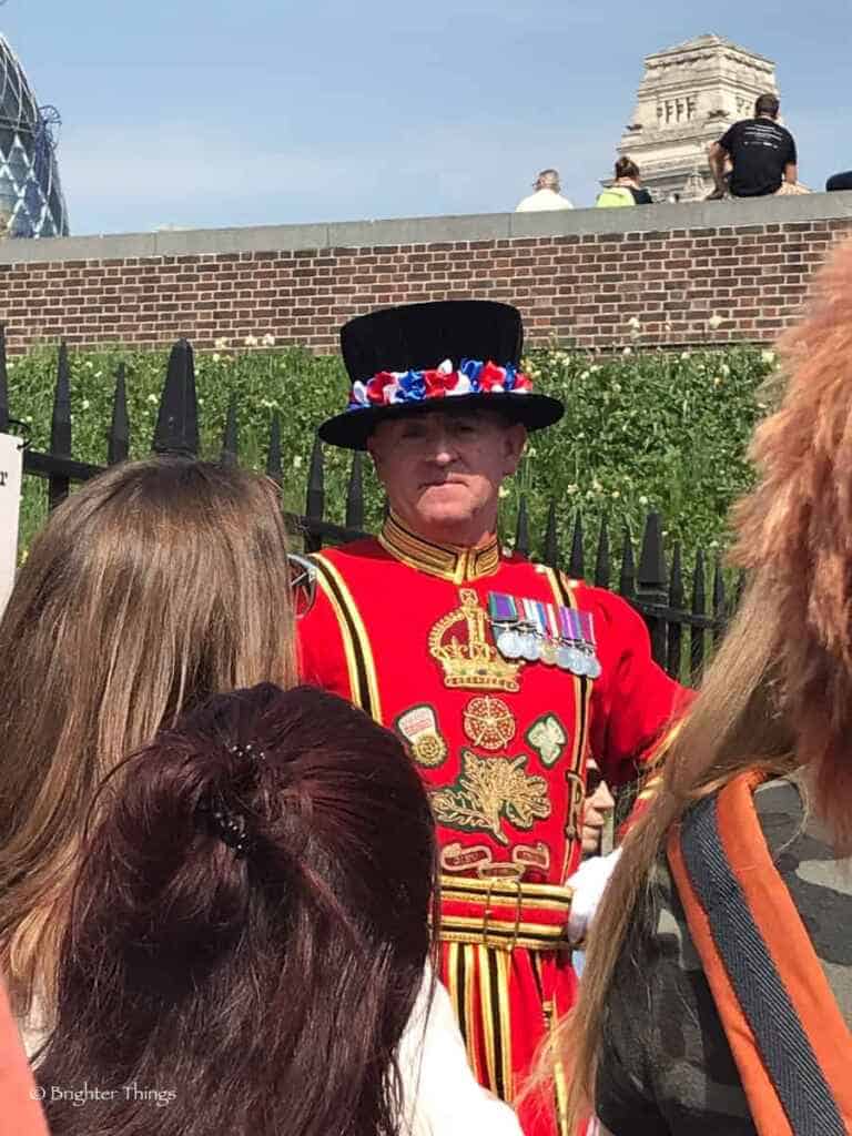 A yeoman of the guard giving us a tour at The Tower one of the historical sites in England.