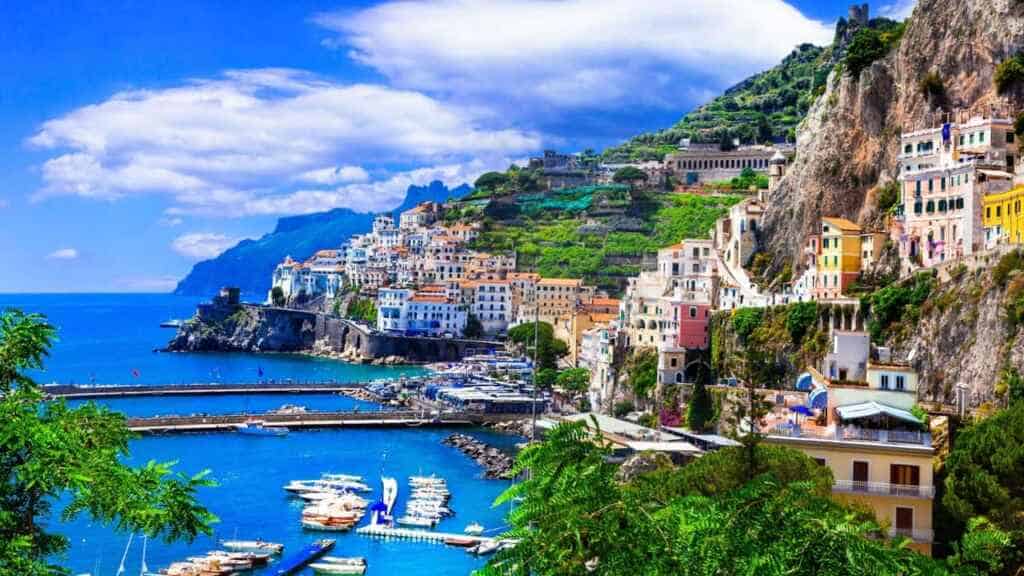 Panoramic view of the colorful buildings of Amalfi, the perfect spot for a European vacation.
