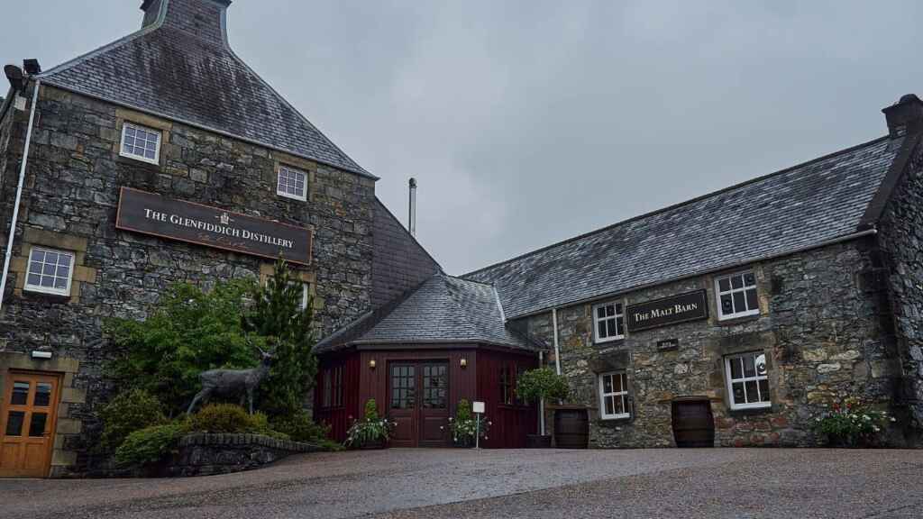 Dufftown, Scotland - 05 22 2018: old stone building of the popular and traditional Glenfiddich distillery in Scotland.