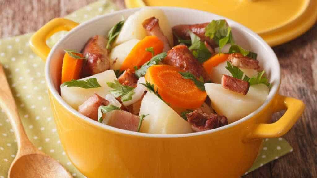 Traditional Irish dish of coddle with sausages, bacon and vegetables
