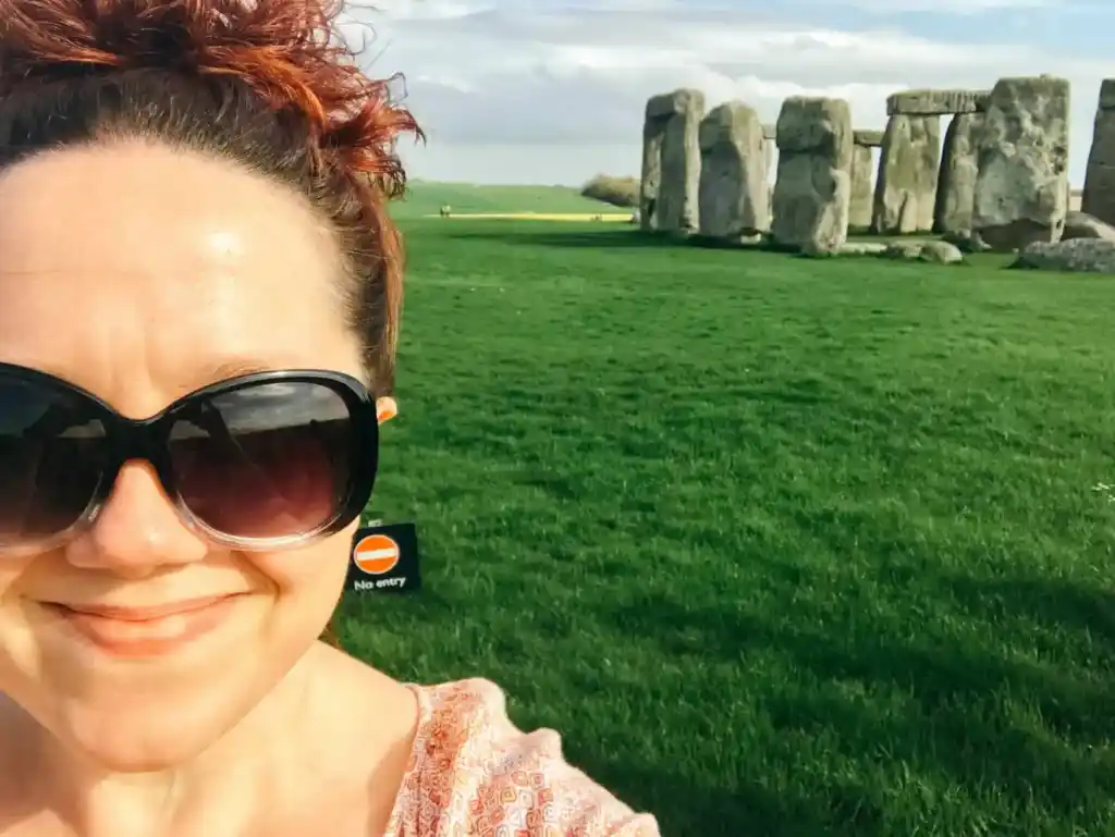 Jessy Hamel taking a selfie in front of Stonehenge
