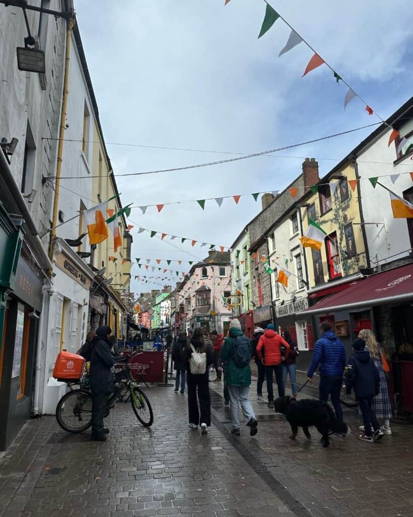 Galway Ireland Street with banners strung between shops and restaurants