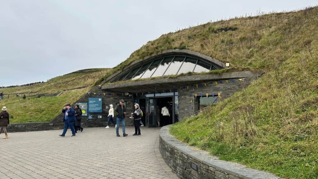 Cliffs of Moher Visitor Center built into the side of the cliff.