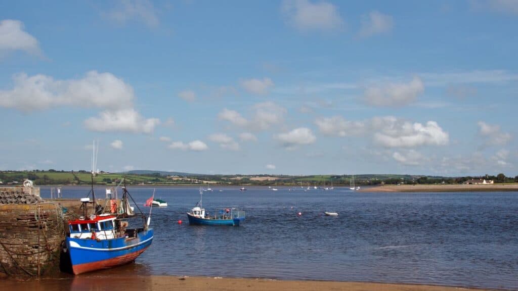 Fishing boat on a dock in youghal harbor ireland