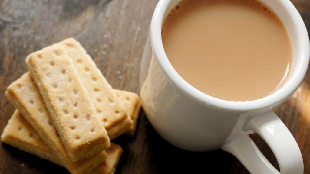 Mug of tea with Shortbread biscuits.