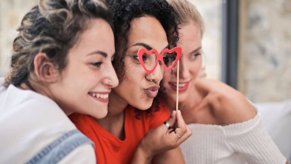 Three Women Posing For Photo in a party photo booth