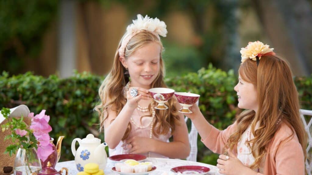 Little girls tea party in the backyard