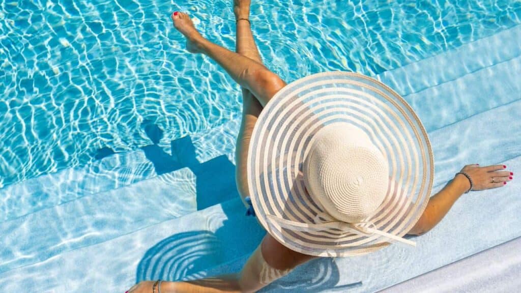 Woman in Luxury Spa Resort Pool