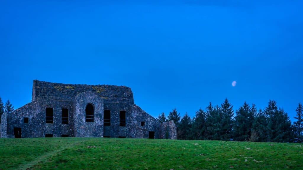 Twilight begins yielding to daylight at Montpelier Hill with view at old abandoned building, Dublin