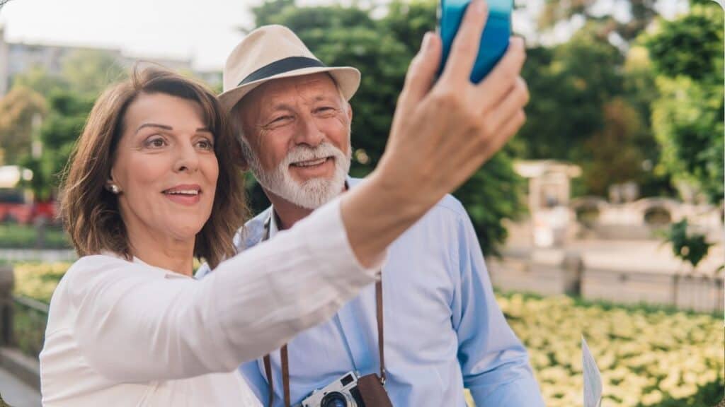 Older couple taking a selfie together