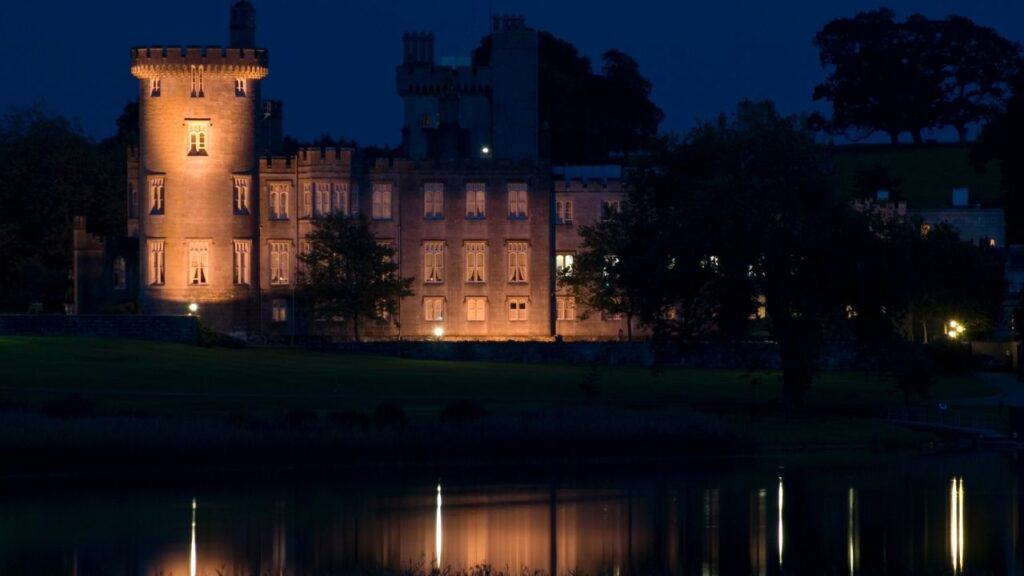 Dromoland Castle Hotel by night, County Clare, Ireland