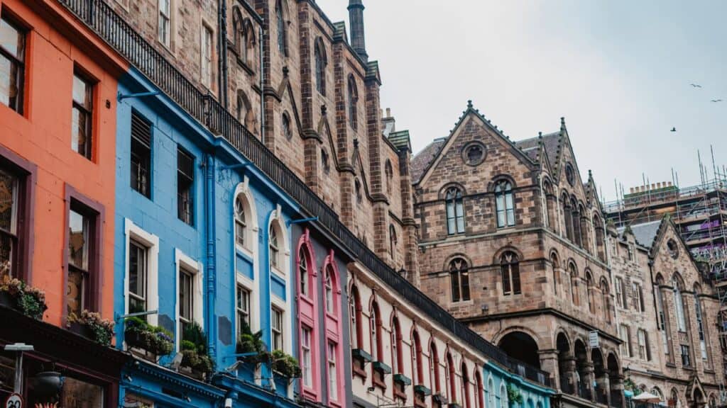 Colorful shop fronts on the famous Victoria Street in Edinburgh's Old Town